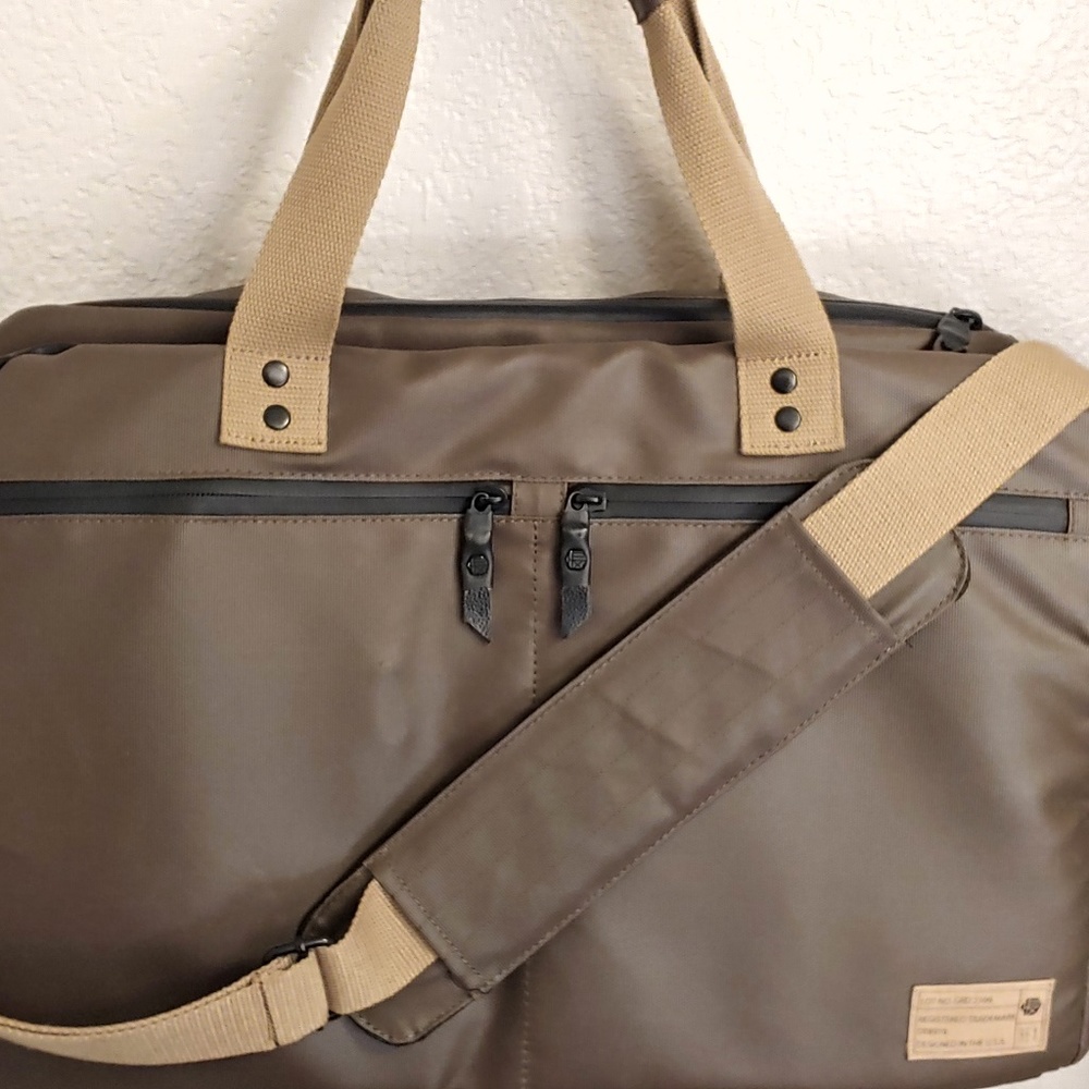 Green weather proof large duffle by Herschel